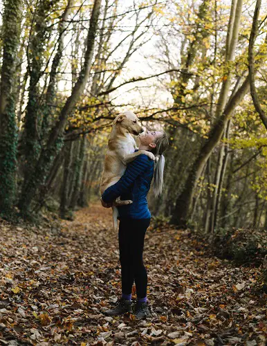 Woman Have Fun Training Dog